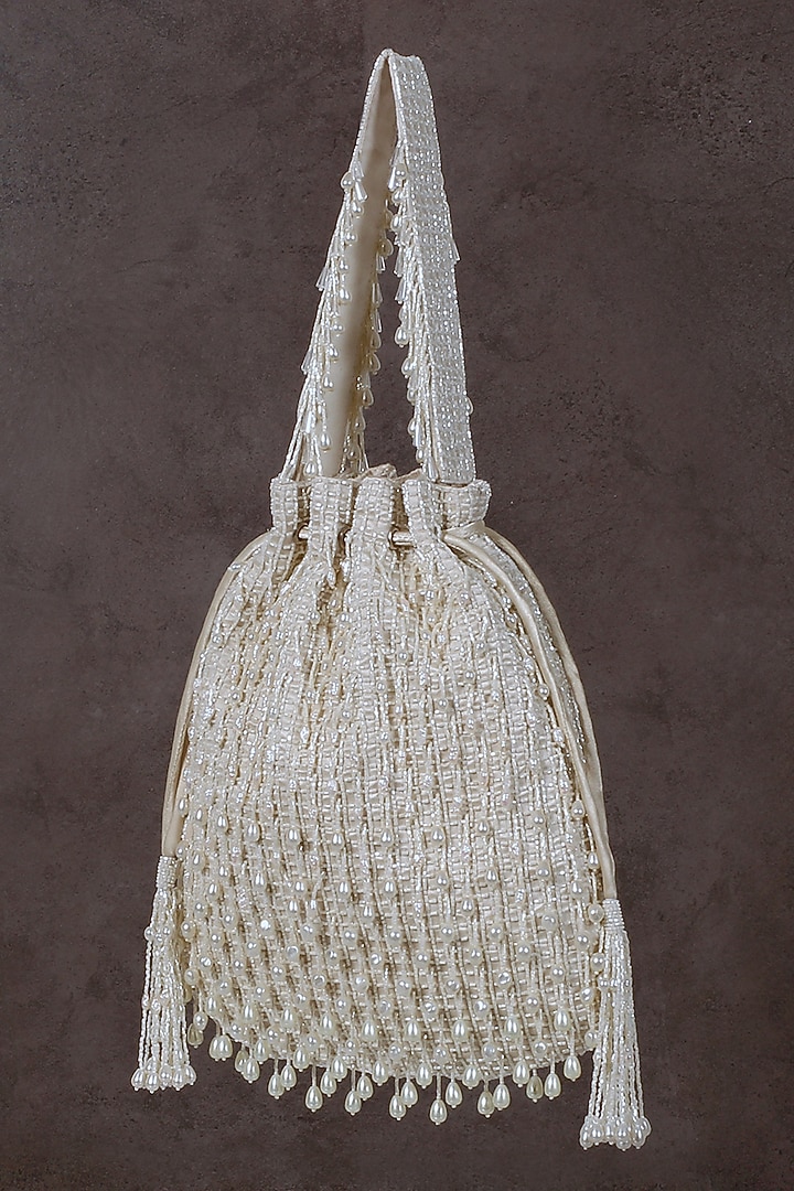 Pristine Ivory Hand Embroidered Potli by Lovetobag at Pernia's Pop Up Shop