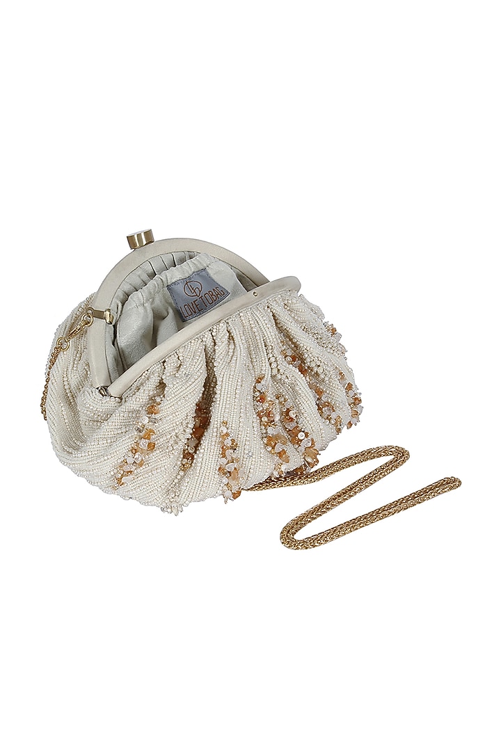 Ivory Satin Embellished Pouch by Lovetobag at Pernia's Pop Up Shop