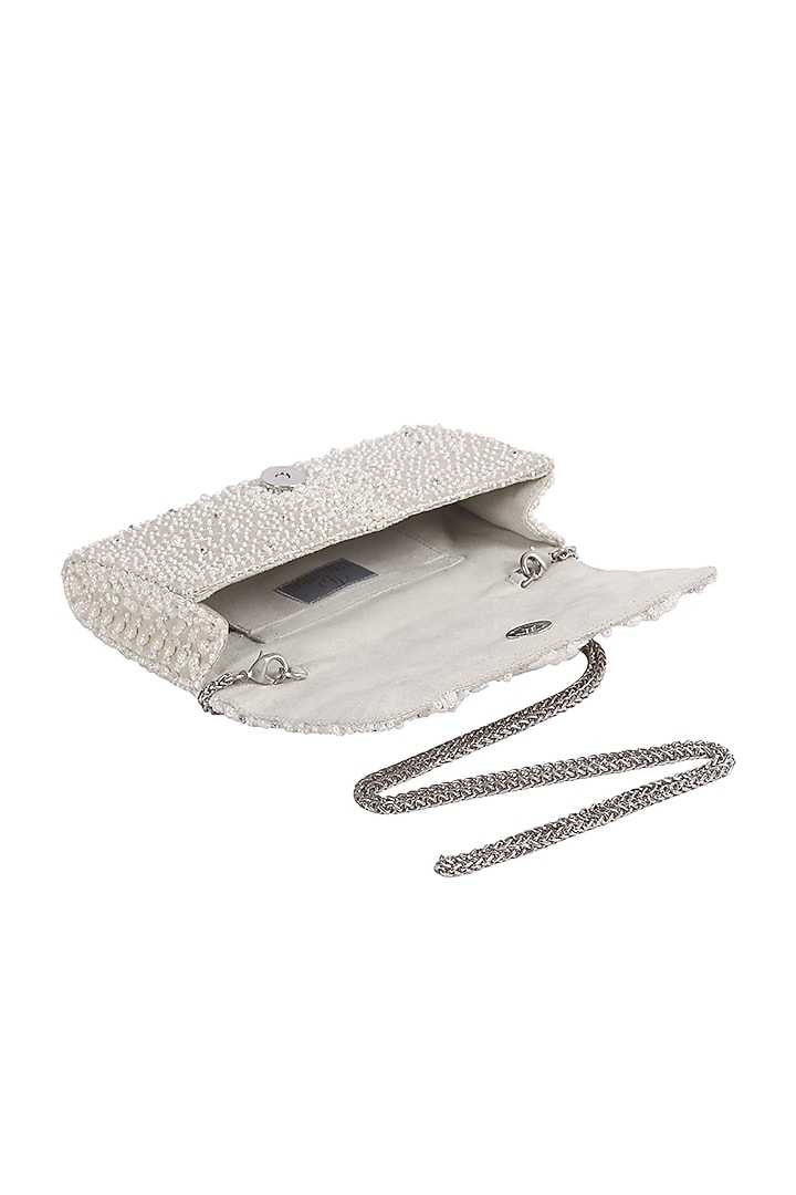 Ivory Embellished Flapover Clutch by Lovetobag at Pernia's Pop Up Shop