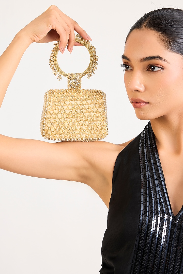 Gold Satin Clutch by Lovetobag at Pernia's Pop Up Shop