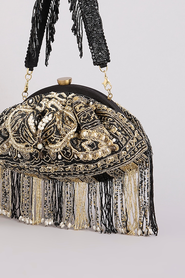 Black Satin & Suedette Clutch by Lovetobag at Pernia's Pop Up Shop
