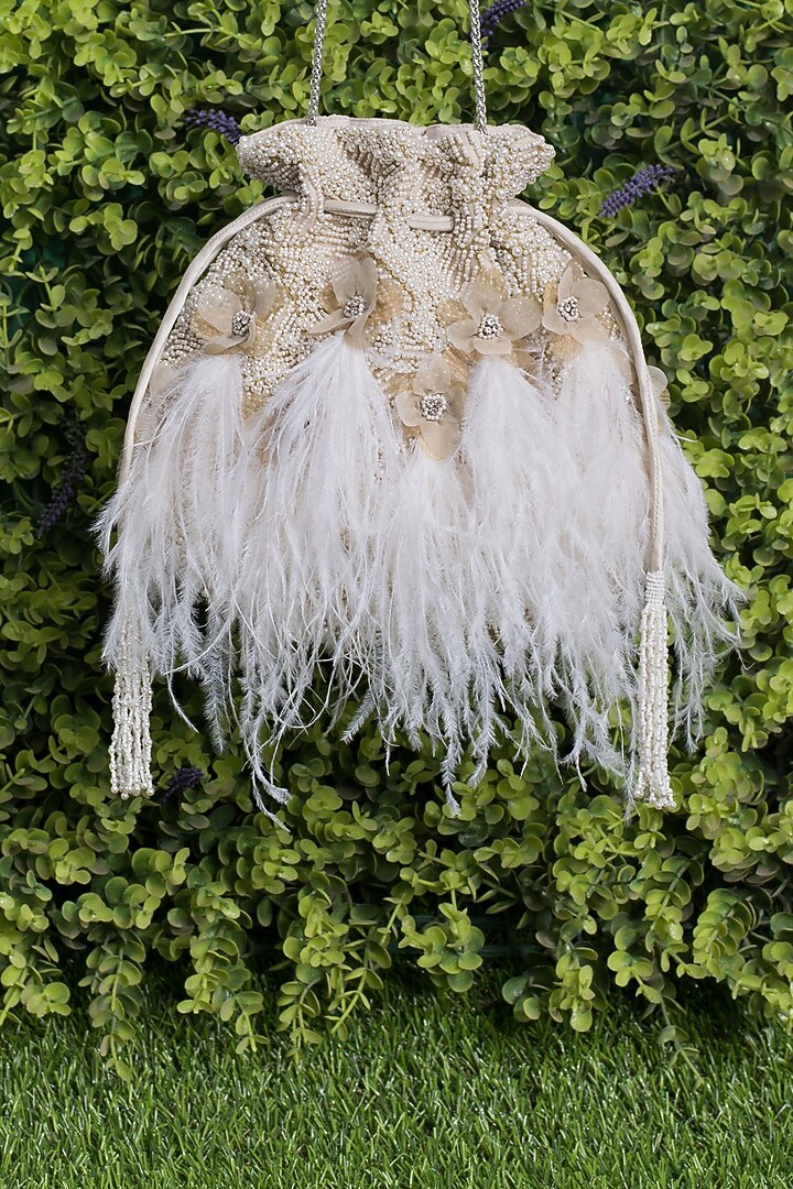 Ivory Floral Embroidered Potli by Lovetobag at Pernia's Pop Up Shop