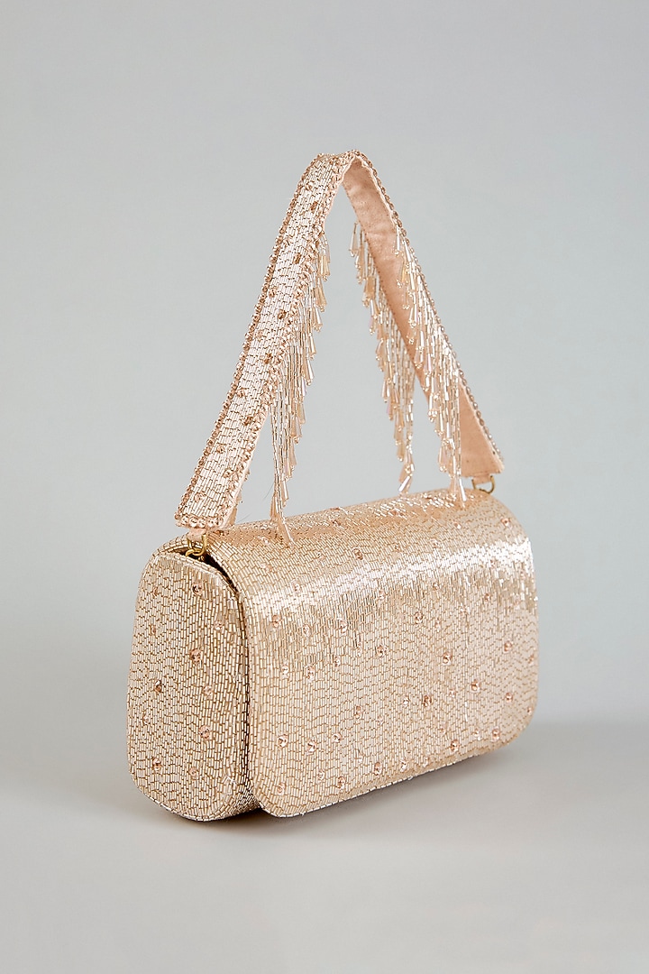 Rose Gold Satin Flapover Clutch by Lovetobag at Pernia's Pop Up Shop