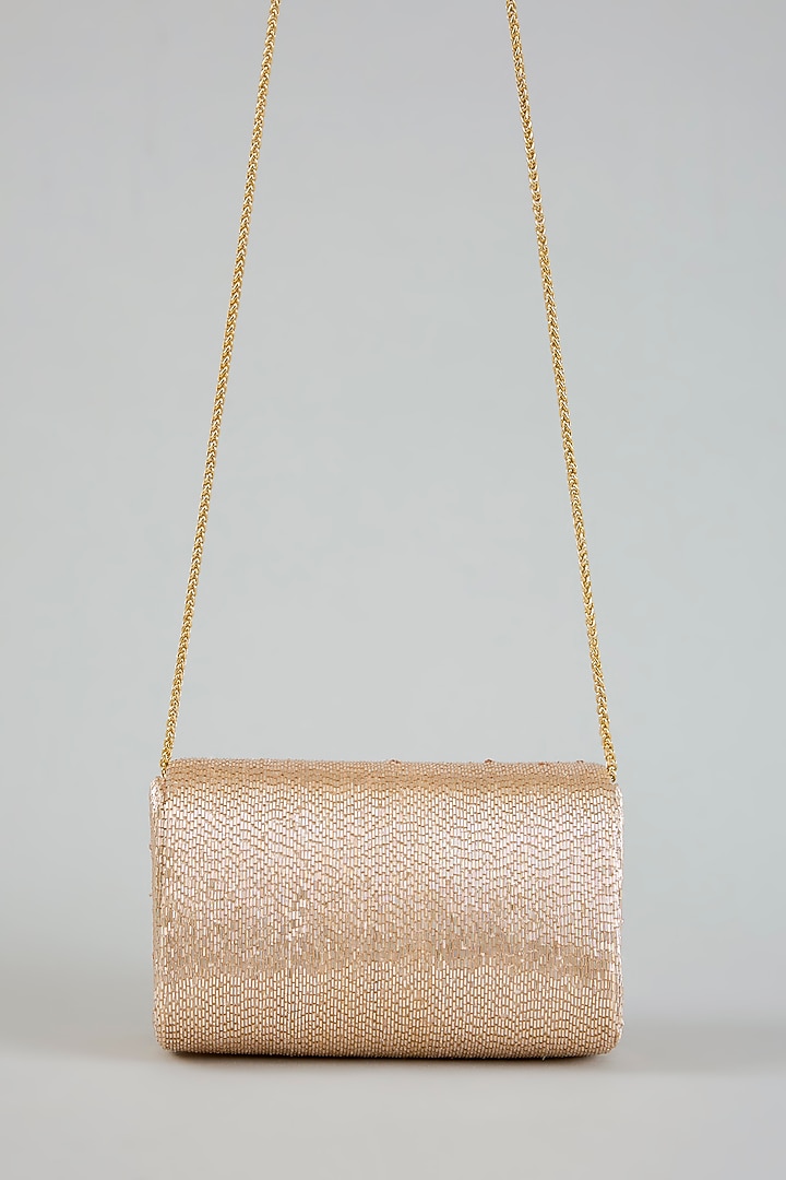 Rose Gold Satin Flapover Clutch by Lovetobag at Pernia's Pop Up Shop