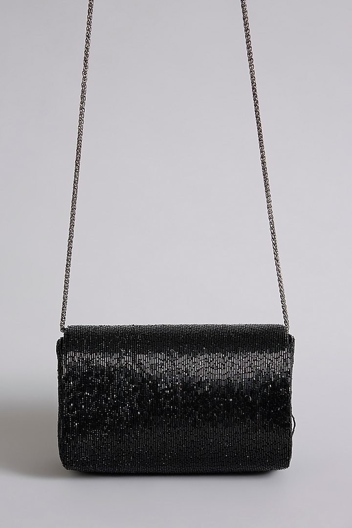 Black Satin & Suedette Clutch by Lovetobag at Pernia's Pop Up Shop