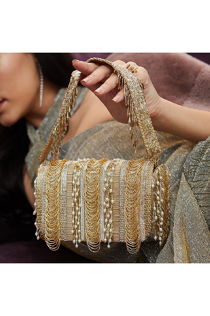 Gold Embroidered Flapover Clutch With Handle by Lovetobag at Pernia's Pop Up Shop