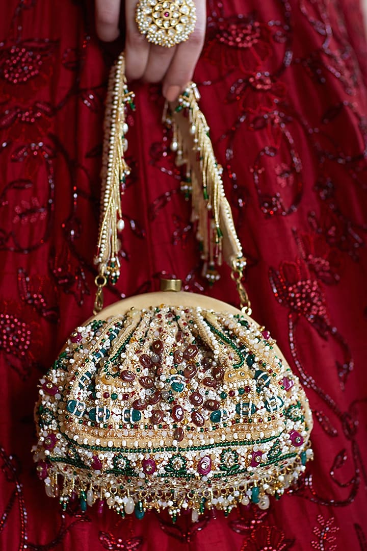 Gold Embroidered Pouch With Handle by Lovetobag at Pernia's Pop Up Shop