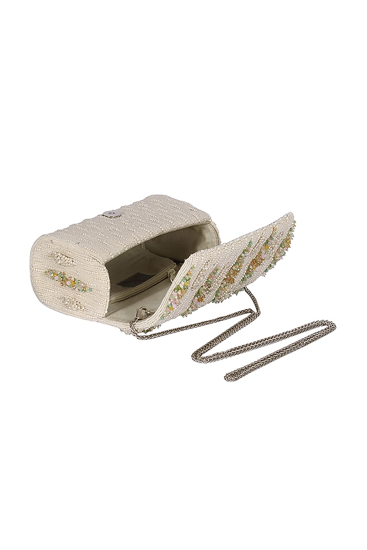 Ivory Embroidered Clutch by Lovetobag at Pernia's Pop Up Shop