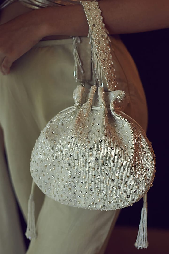 Pristine Ivory Satin Hand Embroidered Potli Bag by Lovetobag at Pernia's Pop Up Shop