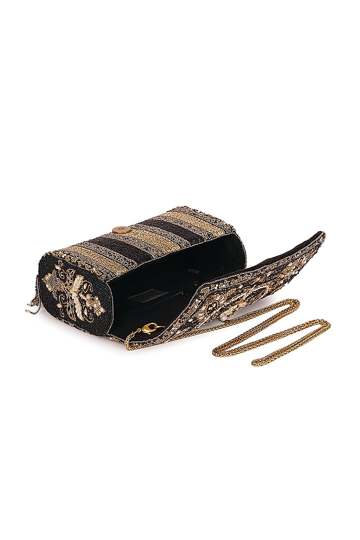 Black Embroidered Flapover Clutch With Handle by Lovetobag at Pernia's Pop Up Shop
