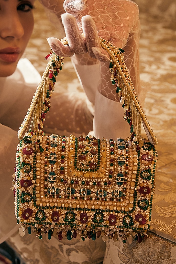 Gold Embellished Flapover Clutch With Handle by Lovetobag at Pernia's Pop Up Shop