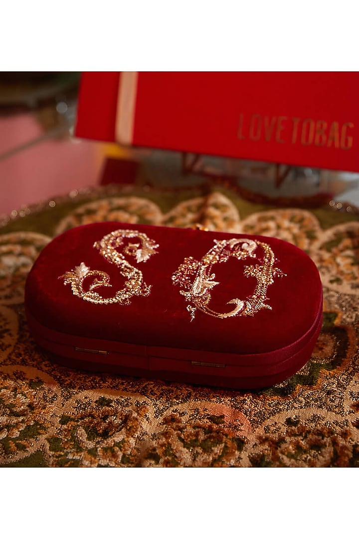 Ruby Red Embroidered Monogram Clutch Bag by Lovetobag at Pernia's Pop Up Shop