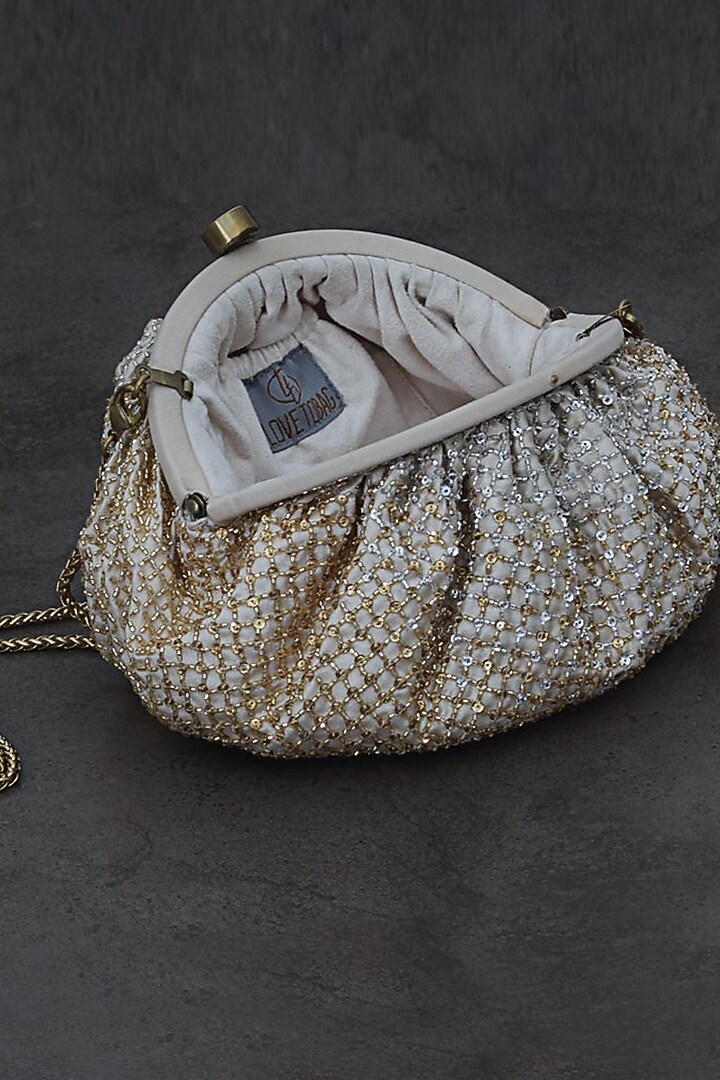 Gold & Silver Hand Embroidered Pouch by Lovetobag at Pernia's Pop Up Shop