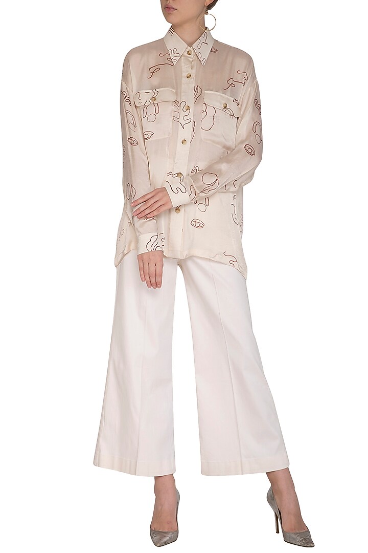 Off White Screen Printed Shirt With Boot-Cut Pants by Little Things Studio at Pernia's Pop Up Shop