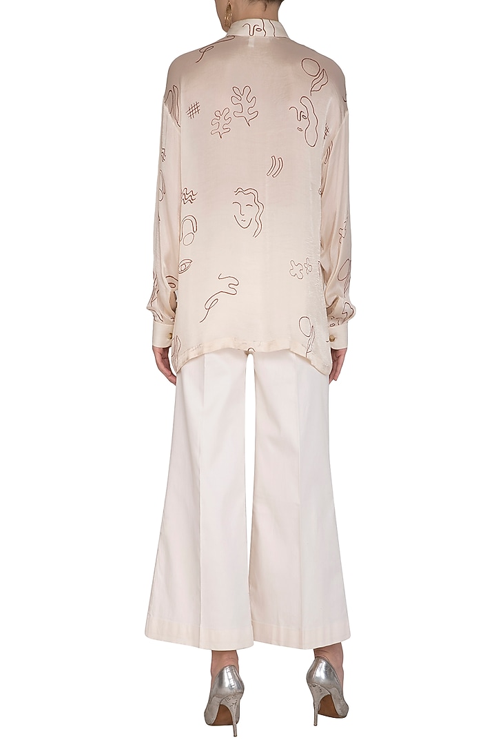Off White Screen Printed Shirt With Boot-Cut Pants by Little Things Studio at Pernia's Pop Up Shop