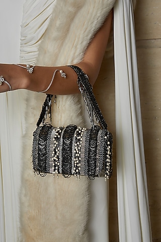 Black Embroidered Flapover Clutch by Lovetobag