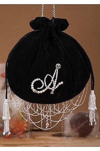 Black Embroidered Calligraphy Potli With Tassels by Lovetobag