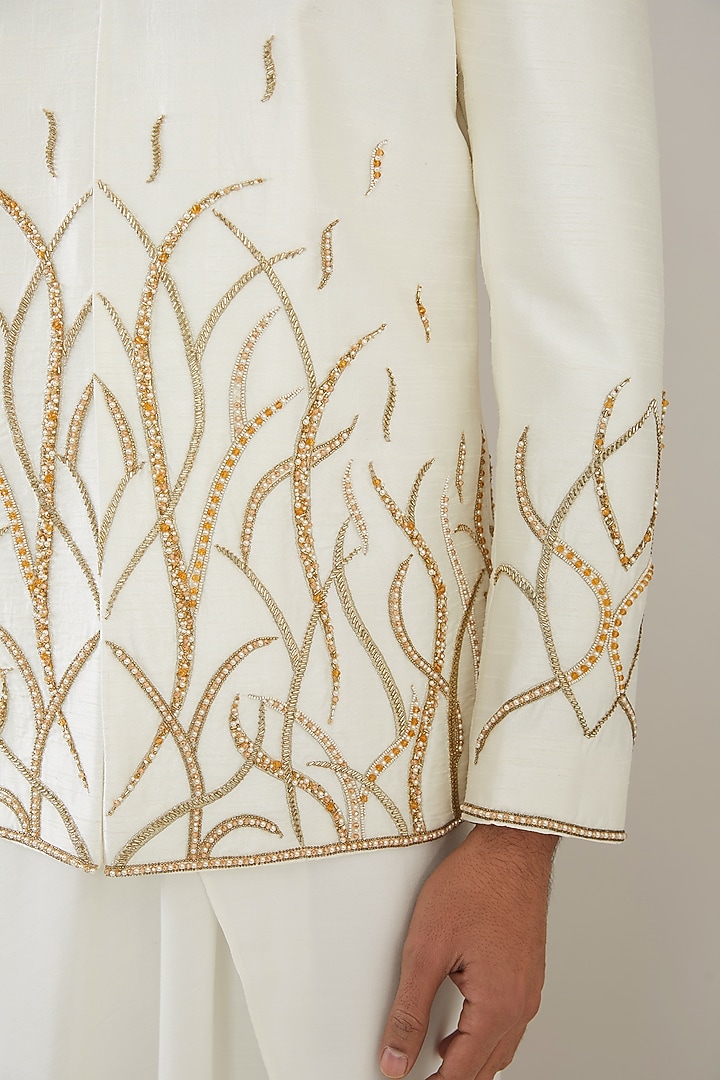 Ivory Raw Silk Hand Embroidered Wedding Bandhgala Set by MARAASIM at Pernia's Pop Up Shop