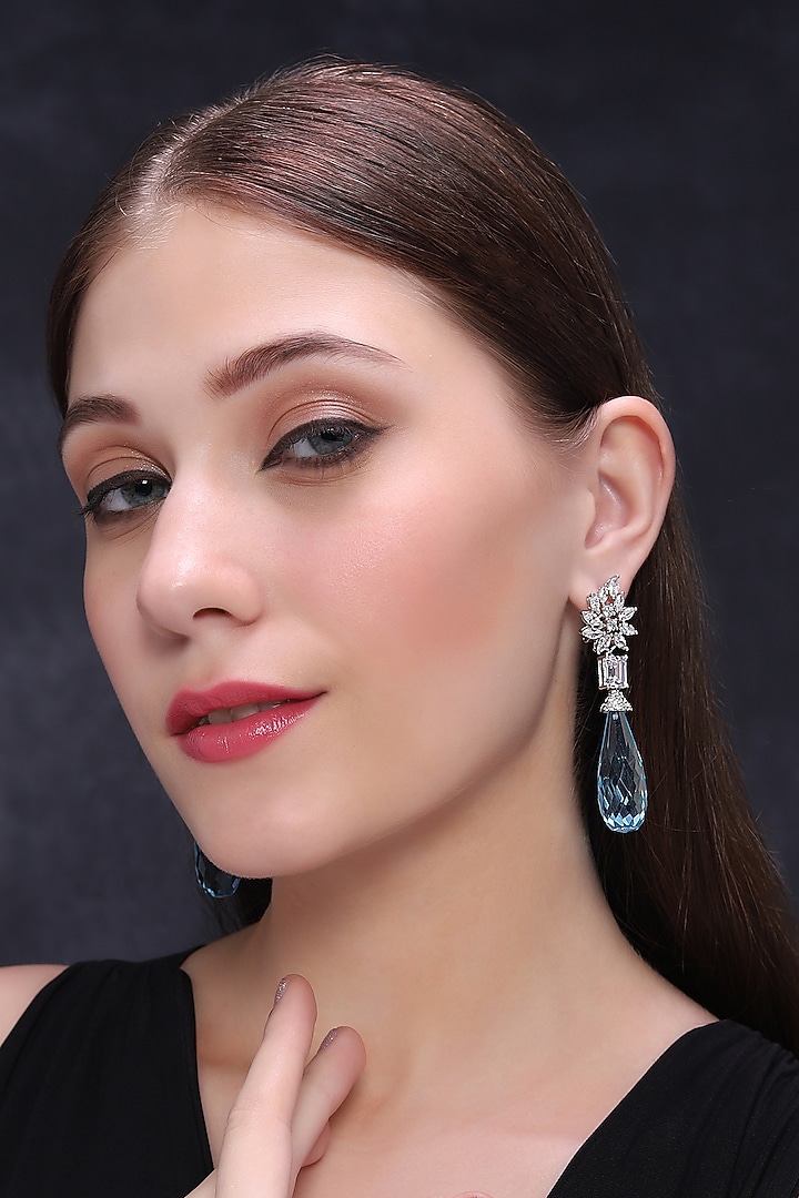White Finish Blue Sapphire Dangler Earrings by Mae Jewellery by Neelu Kedia at Pernia's Pop Up Shop