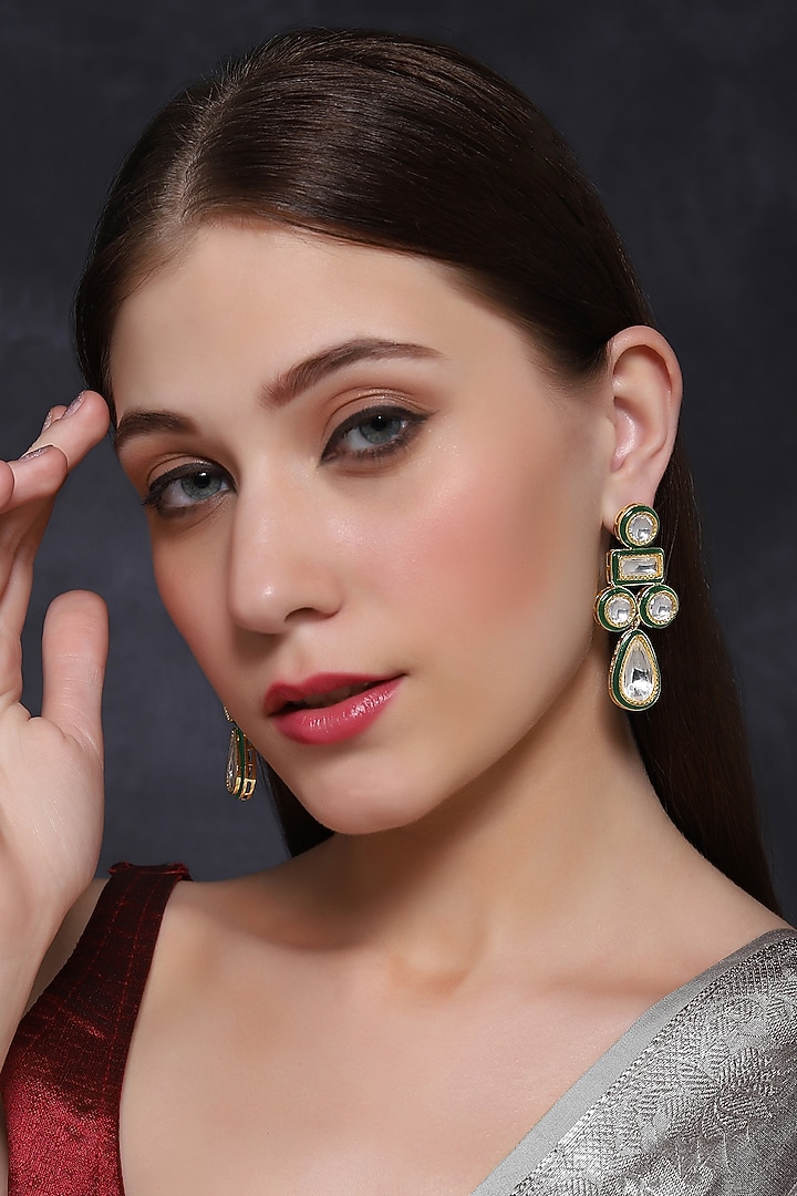 Gold Finish Zircon & Emerald Dangler Earrings by Mae Jewellery by Neelu Kedia at Pernia's Pop Up Shop