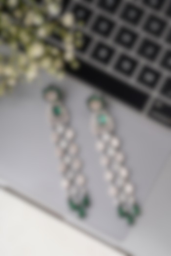 White Finish Zircon & Emerald Dangler Earrings by Mae Jewellery by Neelu Kedia at Pernia's Pop Up Shop