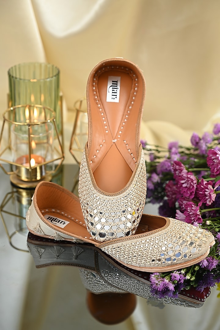 Beige Leather Hand Embroidered Juttis by Miar Designs