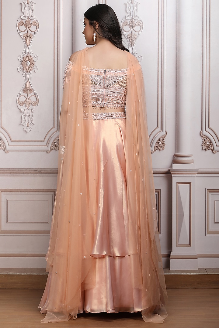 Peach Lurex Georgette Layered Wedding Lehenga Set by Mandira Wirk - Indian at Pernia's Pop Up Shop