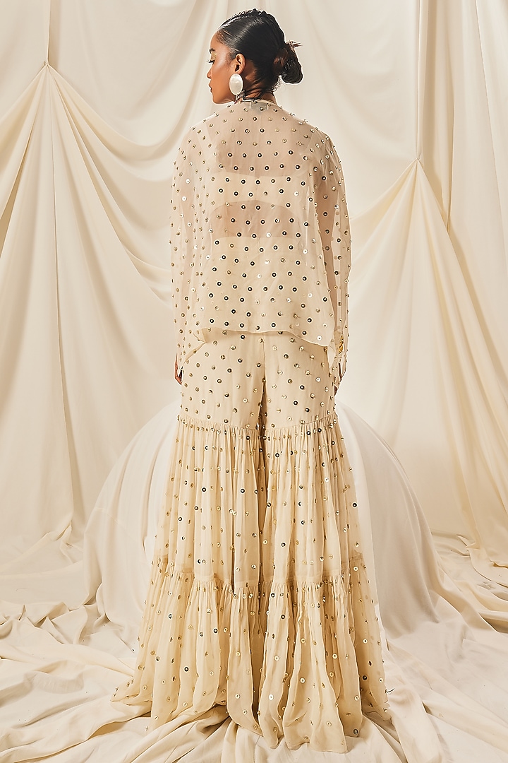 Ivory Silk Organza & Art Silk Sequins Embroidered Tiered Gharara Set by Maison Blu at Pernia's Pop Up Shop