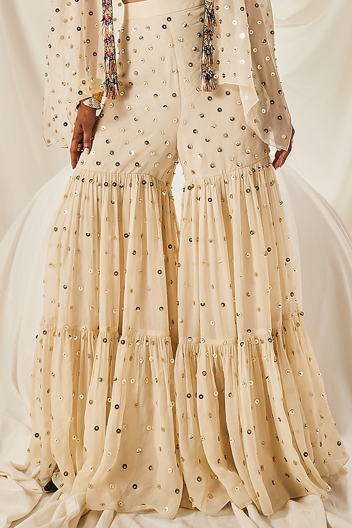 Ivory Silk Organza & Art Silk Sequins Embroidered Tiered Gharara Set by Maison Blu at Pernia's Pop Up Shop