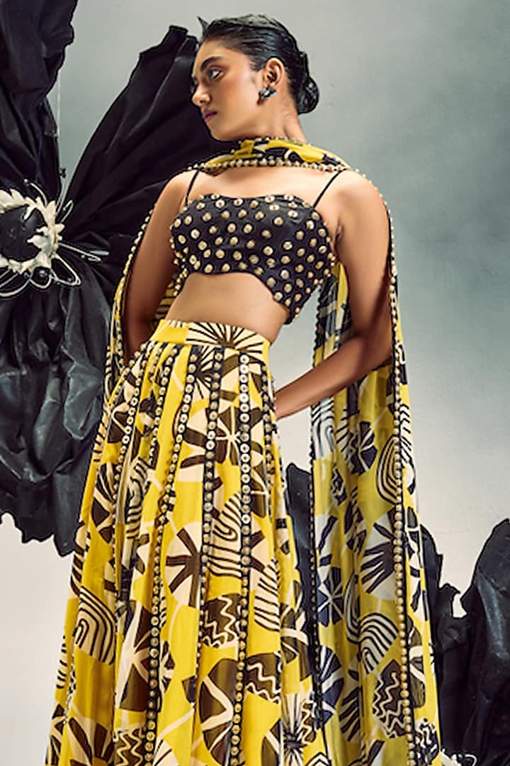 Mustard Yellow & Black Georgette Printed & Embroidered Wedding Lehenga Set by Maison Blu at Pernia's Pop Up Shop