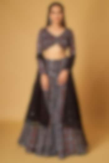 Black Modal Satin Ajrakh Printed & Mirror Embroidered Wedding Lehenga Set by Maisolos at Pernia's Pop Up Shop