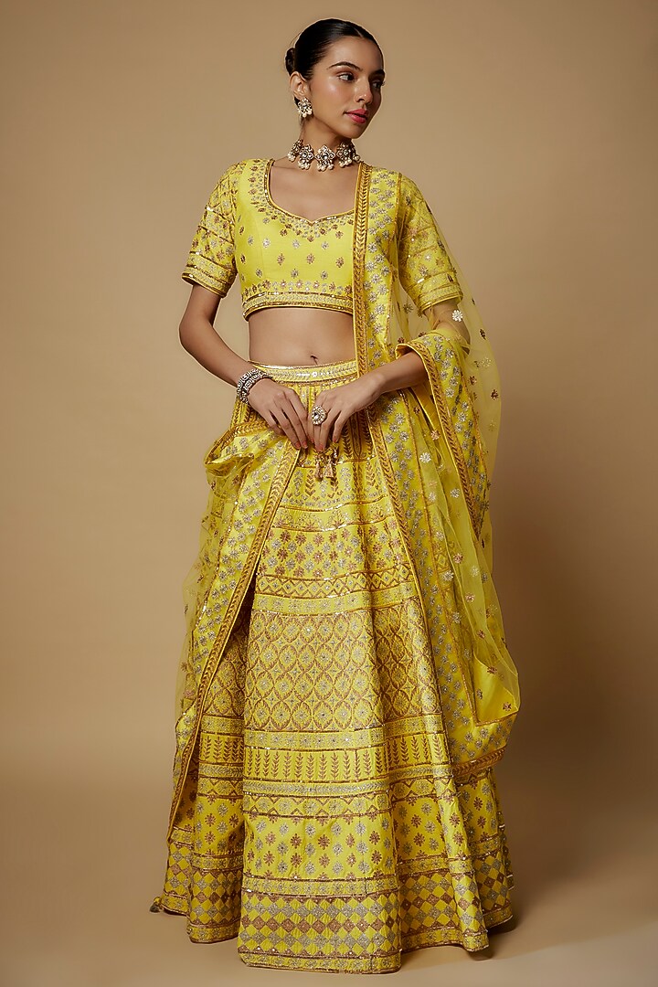 Yellow Raw Silk Aari Embroidered Wedding Lehenga Set by Maisolos at Pernia's Pop Up Shop