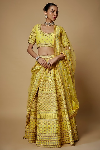 Yellow Raw Silk Aari Embroidered Lehenga Set by Maisolos