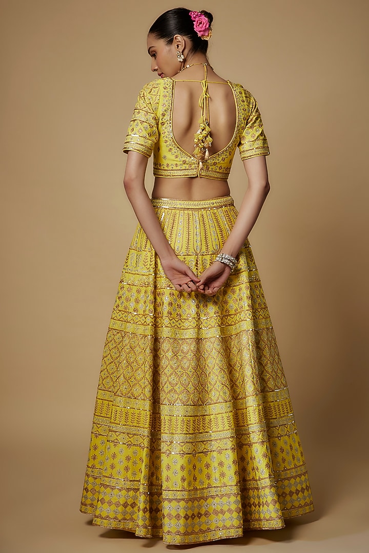 Yellow Raw Silk Aari Embroidered Wedding Lehenga Set by Maisolos at Pernia's Pop Up Shop