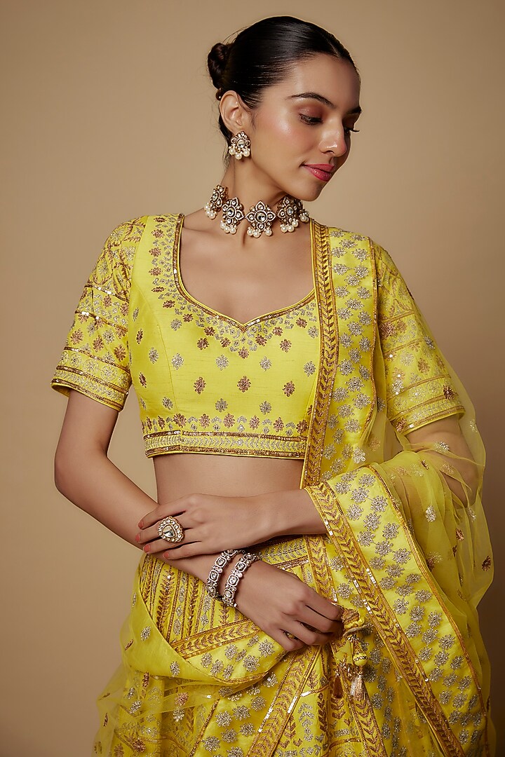 Yellow Raw Silk Aari Embroidered Wedding Lehenga Set by Maisolos at Pernia's Pop Up Shop