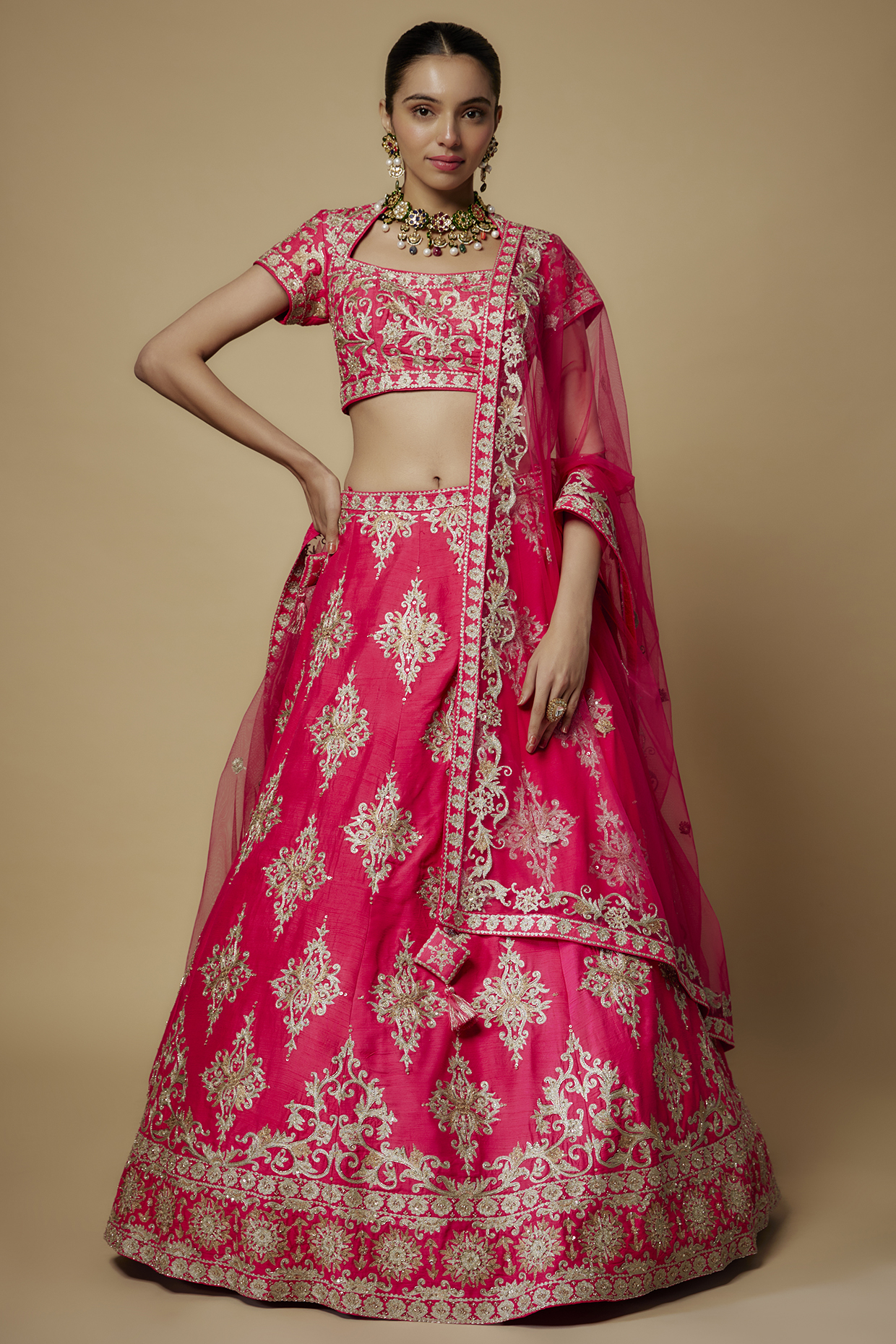 Fuchsia Pink Raw Silk & Net Aari Embroidered Wedding Lehenga Set by Maisolos at Pernia's Pop Up Shop