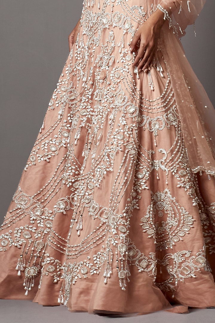 Rose Dust Net Handwork & Pearl Embellished Bridal Lehenga Set by Mala and Kinnary at Pernia's Pop Up Shop