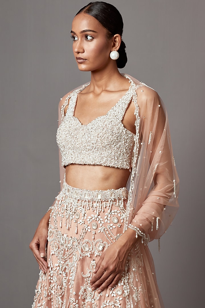 Rose Dust Net Handwork & Pearl Embellished Bridal Lehenga Set by Mala and Kinnary at Pernia's Pop Up Shop