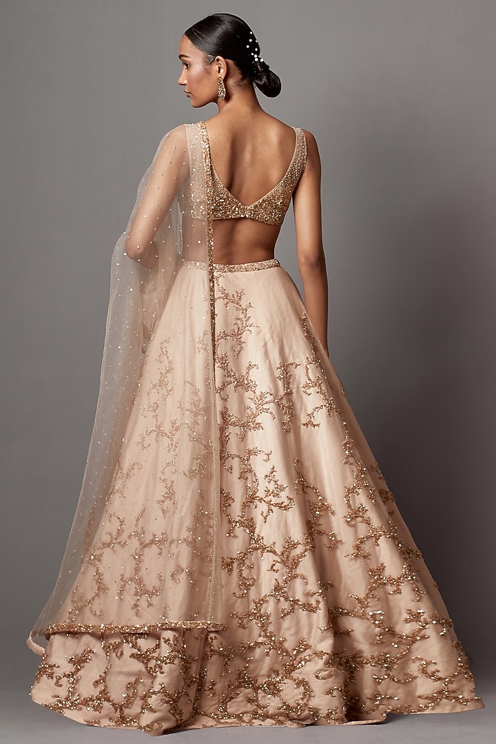 Beige Net Hand Embroidered Bridal Lehenga Set by Mala and Kinnary at Pernia's Pop Up Shop