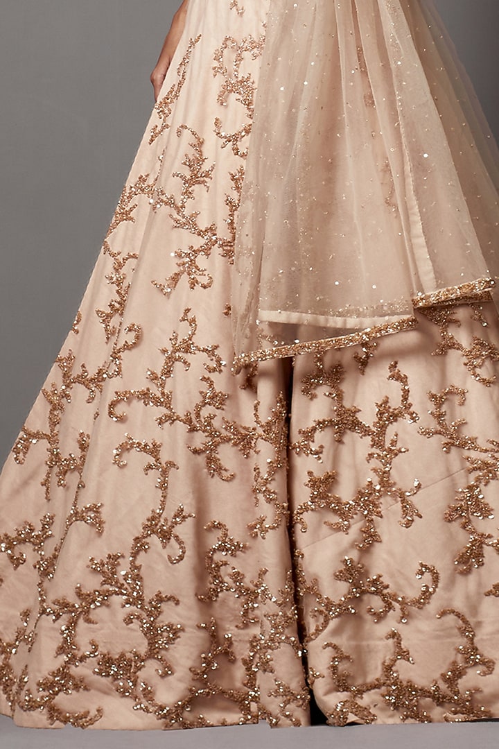 Beige Net Hand Embroidered Bridal Lehenga Set by Mala and Kinnary at Pernia's Pop Up Shop