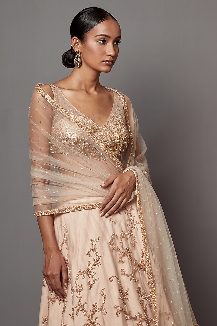 Beige Net Hand Embroidered Bridal Lehenga Set by Mala and Kinnary at Pernia's Pop Up Shop