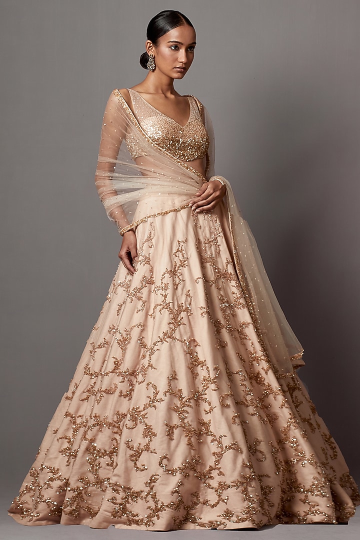 Beige Net Hand Embroidered Bridal Lehenga Set by Mala and Kinnary at Pernia's Pop Up Shop