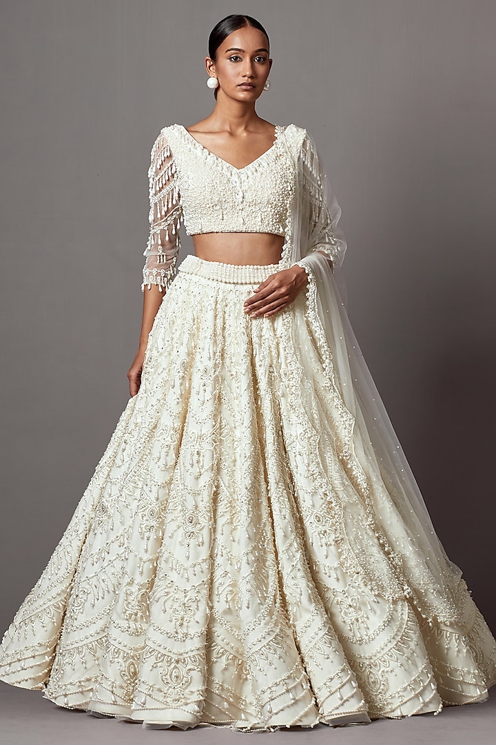 Ivory Net Pearl Embroidered Bridal Lehenga Set by Mala and Kinnary at Pernia's Pop Up Shop