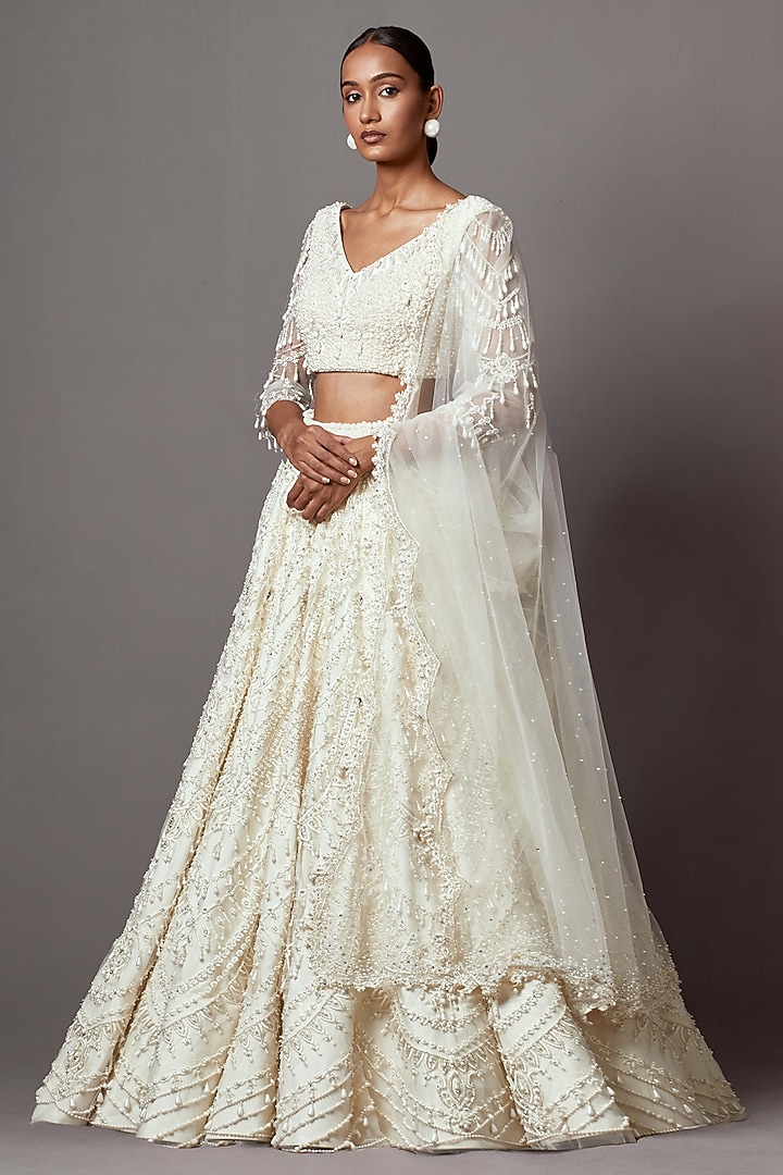 Ivory Net Pearl Embroidered Bridal Lehenga Set by Mala and Kinnary at Pernia's Pop Up Shop