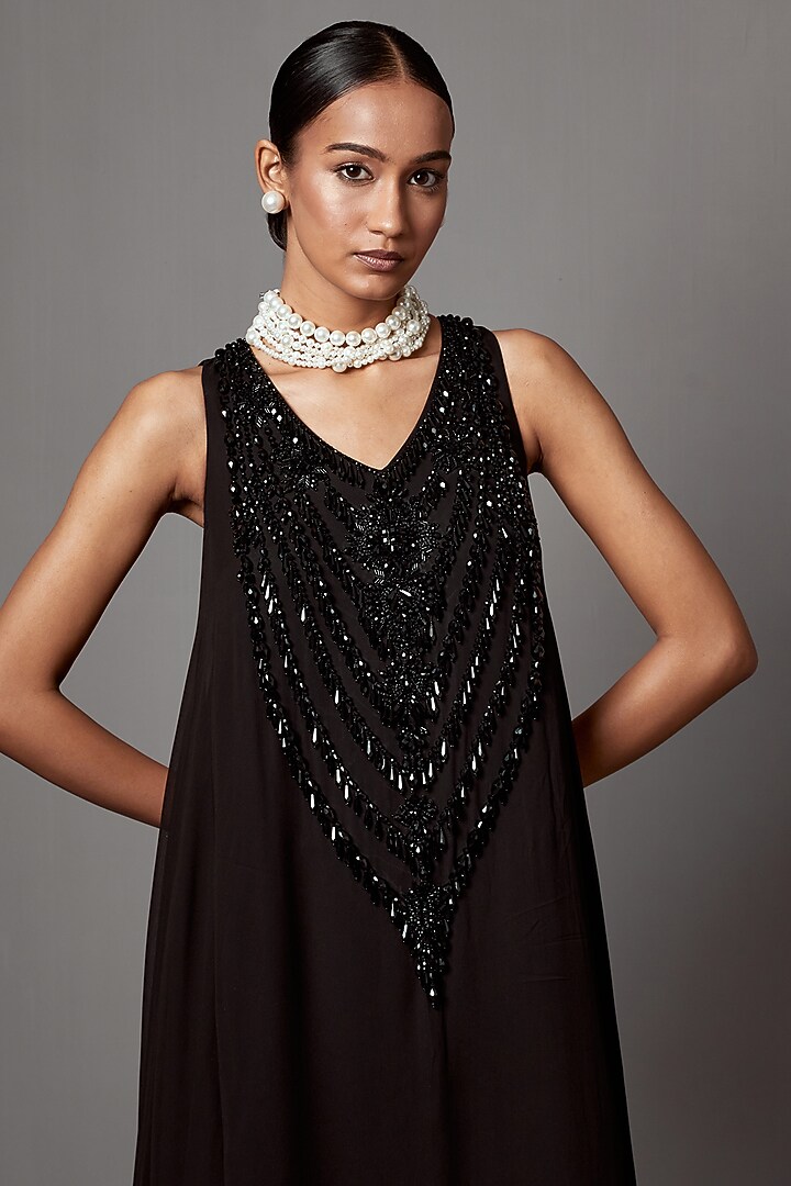 Black Georgette Crystal & Tassel Work Maxi Party Wear Dress by Mala and Kinnary at Pernia's Pop Up Shop