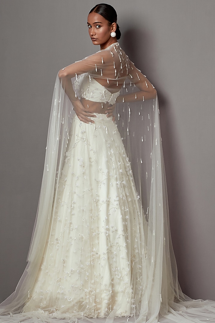Ivory Net Hand Embroidered Bridal Lehenga Set by Mala and Kinnary at Pernia's Pop Up Shop