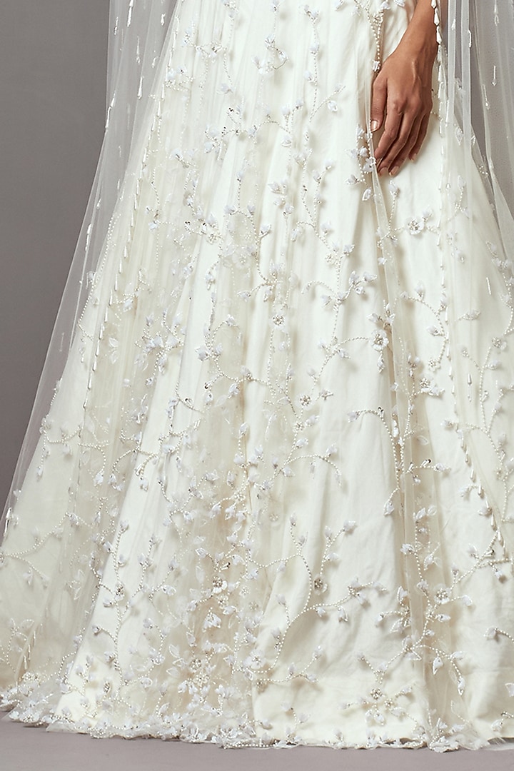Ivory Net Hand Embroidered Bridal Lehenga Set by Mala and Kinnary at Pernia's Pop Up Shop