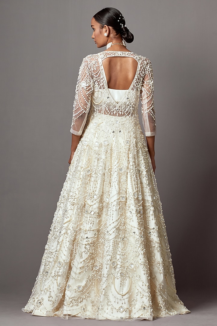 Ivory Taffeta & Net Hand Embroidered Jacket Bridal Lehenga Set by Mala and Kinnary at Pernia's Pop Up Shop