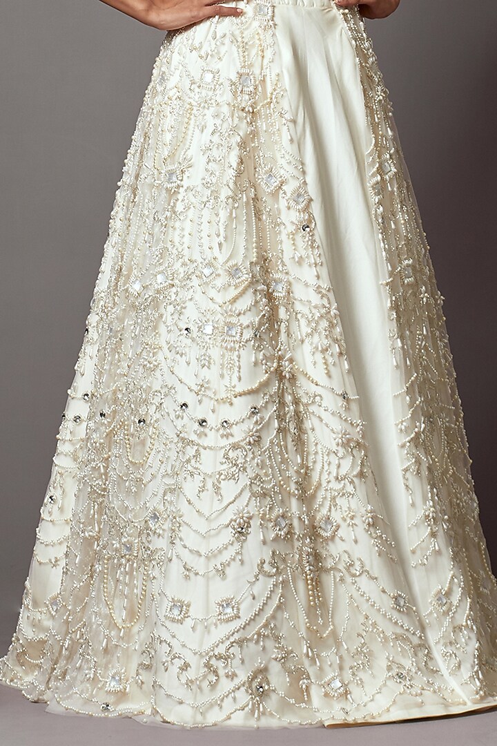 Ivory Taffeta & Net Hand Embroidered Jacket Bridal Lehenga Set by Mala and Kinnary at Pernia's Pop Up Shop