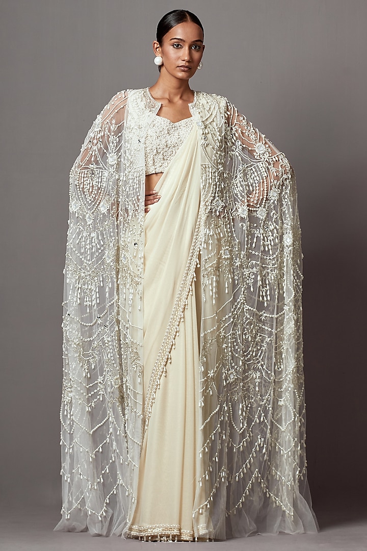 Ivory Foil Georgette & Net Pearl Handwork Jacket Saree Set by Mala and Kinnary